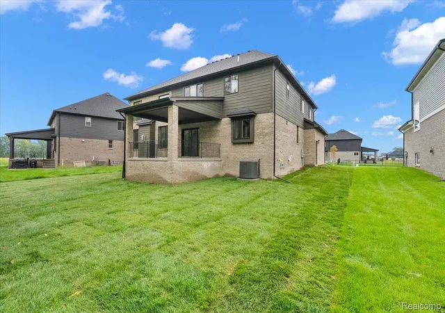Photo 3 of Single family home for sale at 50419 Arcadia Dr, Macomb, MI 48042 | MLS# 20261052571 | Listing updated on 2026-10-20
