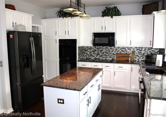 Photo 4 of Single family home for sale at 48172 Royal Pointe Dr, Canton, MI 48187 | MLS# 20261053799 | Listing updated on 2026-09-30