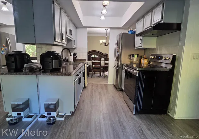 Photo 3 of Condo for sale at 1105 Kirts Blvd #A, Troy, MI 48084 | MLS# 20261053839 | Listing updated on 2026-10-04