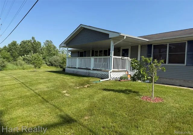 Photo 2 of Single family home for sale at 909 W Barnes Rd, Fostoria, MI 48435 | MLS# 20261058242 | Listing updated on 2026-09-23