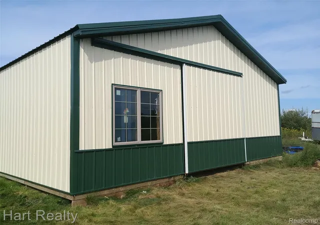 Photo 3 of Single family home for sale at 909 W Barnes Rd, Fostoria, MI 48435 | MLS# 20261058242 | Listing updated on 2026-09-23