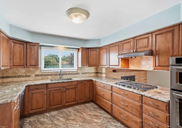 Photo 1 of Sale Pending at 14597 Common Rd, Warren, MI 48088 | MLS# 58050218659 | Listing updated on 2026-09-09