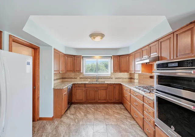 Photo 3 of Single family home for sale at 14597 Common Rd, Warren, MI 48088 | MLS# 58050218659 | Listing updated on 2026-10-17
