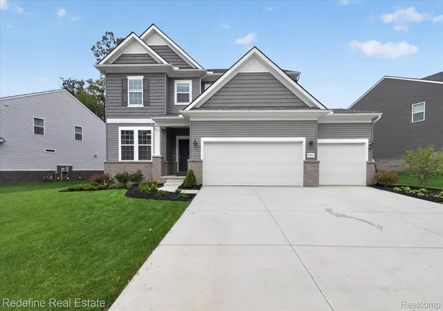 Single family home for sale at 59564 Schuss Gully Dr, New Hudson, MI 48165 | MLS# 20261068577