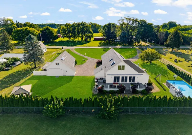 Photo 2 of Single family home for sale at 59441 Romeo Plank Rd, Ray Township Macomb, MI 48096 | MLS# 58050220221 | Listing updated on 2026-10-09
