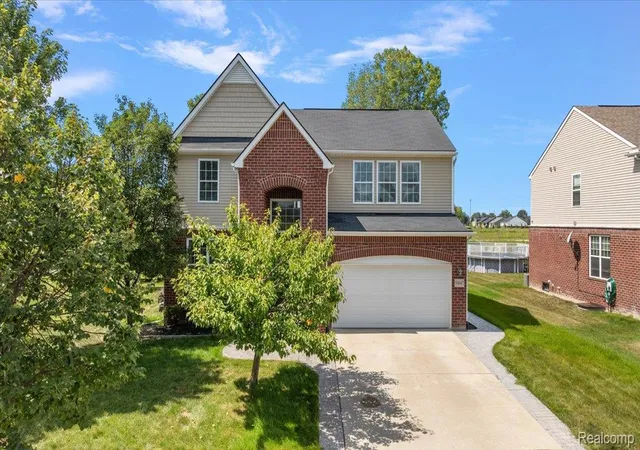 Photo 2 of Single family home for sale at 50647 Bredenbury Dr, Macomb, MI 48044 | MLS# 20261069510 | Listing updated on 2026-09-17