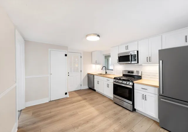 Photo 2 of Multi family home for sale at 1031 Hamilton Ave NW, Grand Rapids, MI 49504 | MLS# 65026046308 | Listing updated on 2026-09-03