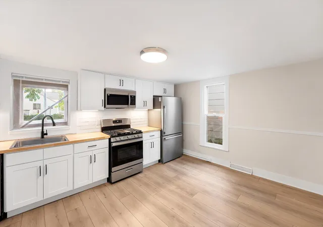 Photo 3 of Multi family home for sale at 1031 Hamilton Ave NW, Grand Rapids, MI 49504 | MLS# 65026046308 | Listing updated on 2026-09-03