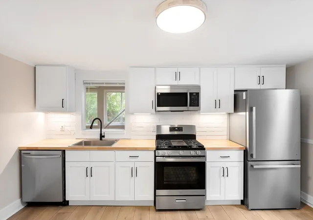 Photo 4 of Multi family home for sale at 1031 Hamilton Ave NW, Grand Rapids, MI 49504 | MLS# 65026046308 | Listing updated on 2026-09-03