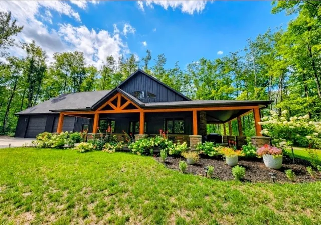 Photo 1 of Single family home for sale at 7020 Woodridge Ct, Mancelona, MI 49659 | MLS# 78080073097 | Listing updated on 2026-09-07