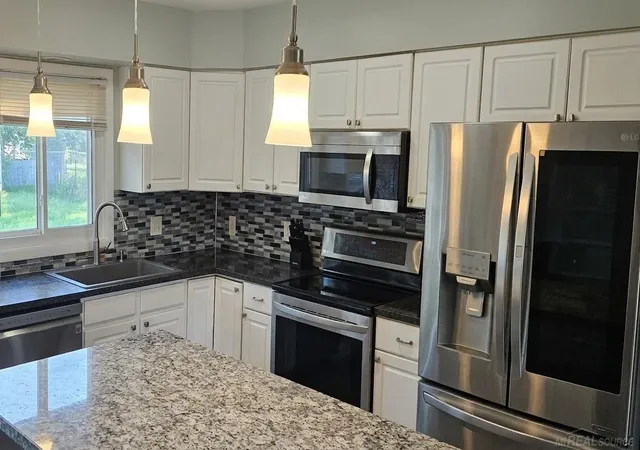 Photo 3 of Single family home for sale at 631 Kinney Ave, Grand Rapids, MI 49534 | MLS# 58050220629 | Listing updated on 2026-09-16