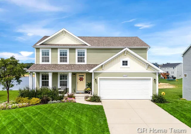 Single family home for sale at 14479 Tupelo Dr, West Olive, MI 49460 | MLS# 65026046739