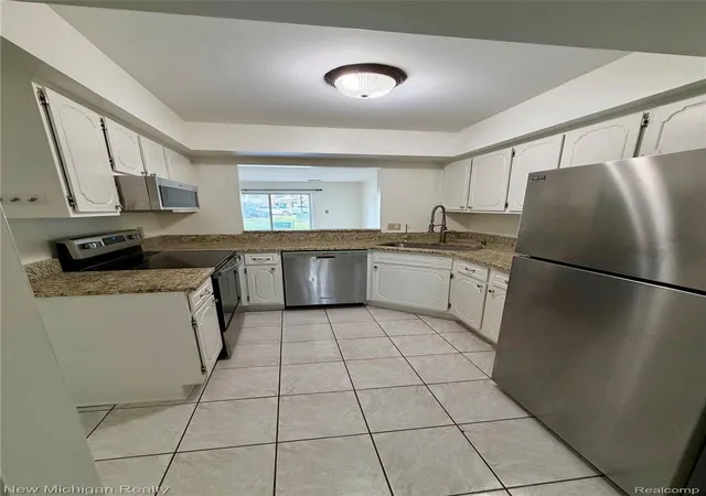 Photo 3 of Condo for sale at 854 N Main St, Milford, MI 48381 | MLS# 20261070905 | Listing updated on 2026-09-14