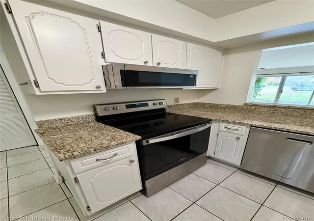 Photo 4 of Condo for sale at 854 N Main St, Milford, MI 48381 | MLS# 20261070905 | Listing updated on 2026-09-14
