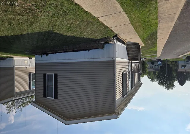 Photo 2 of Single family home for sale at 28958 Country Ln, Flat Rock, MI 48134 | MLS# 20261070963 | Listing updated on 2026-09-09