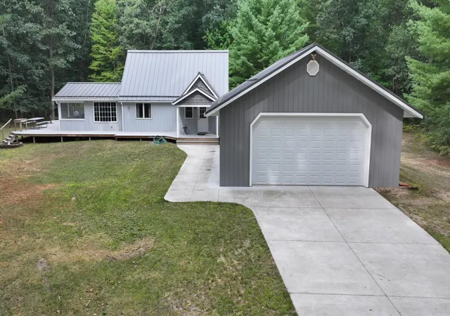 Single family home for sale at 7261 N Bass Lake Rd, Irons, MI 49644 | MLS# 67026047107