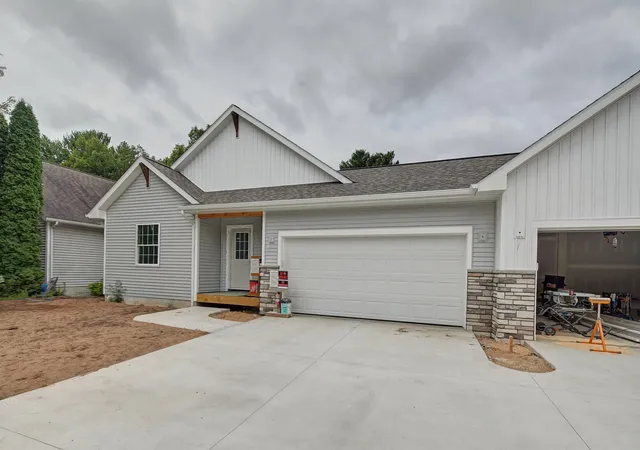 Photo 1 of Condo for sale at 1706 Woodward Ave, Traverse City, MI 49686 | MLS# 78080073289 | Listing updated on 2026-09-08