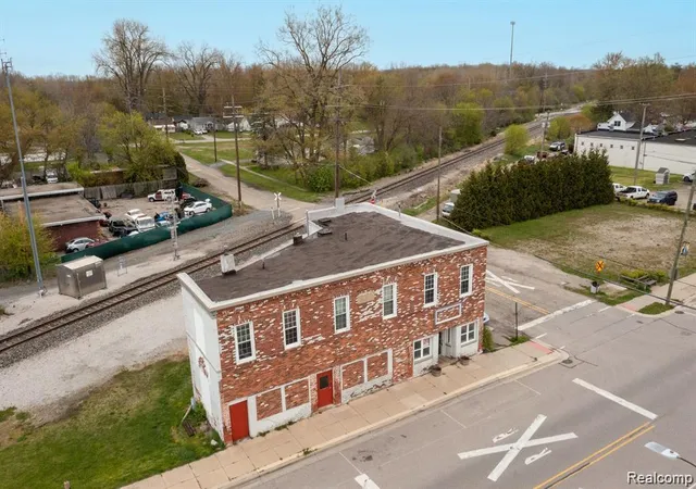 Photo 1 of Multi family home for sale at 910 Monroe St, Carleton, MI 48117 | MLS# 20261071716 | Listing updated on 2026-09-05