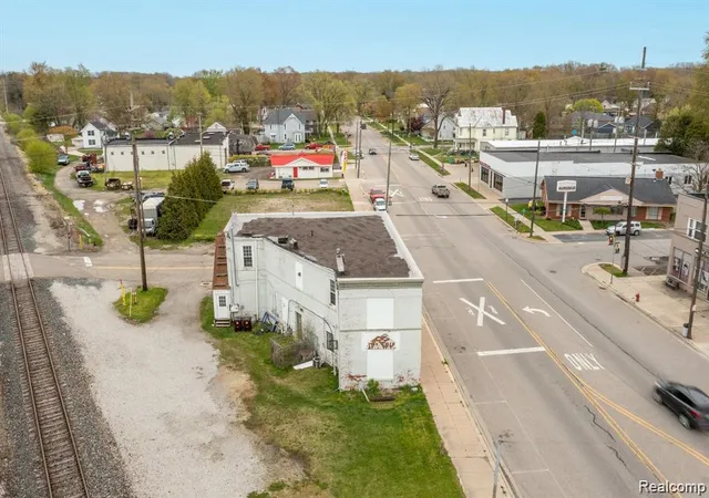Photo 3 of Multi family home for sale at 910 Monroe St, Carleton, MI 48117 | MLS# 20261071716 | Listing updated on 2026-09-05