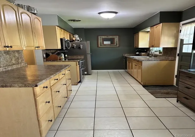 Photo 3 of Single family home for sale at 1702 Leif Ave, Norton Shores, MI 49441 | MLS# 20261072024 | Listing updated on 2026-09-18