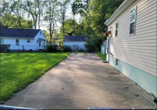 Photo 3 of Single family home for sale at 1159 Sutton Ave, Flint, MI 48504 | MLS# 20261072143 | Listing updated on 2026-09-10