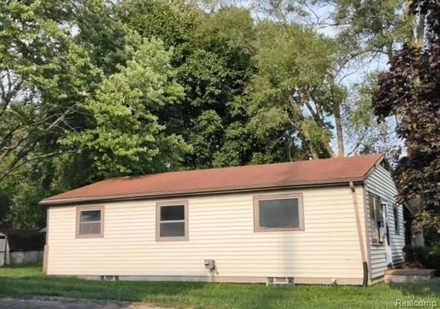 Photo 2 of Single family home for sale at 1008 Reo Rd, Lansing, MI 48910 | MLS# 20261072338 | Listing updated on 2026-09-09