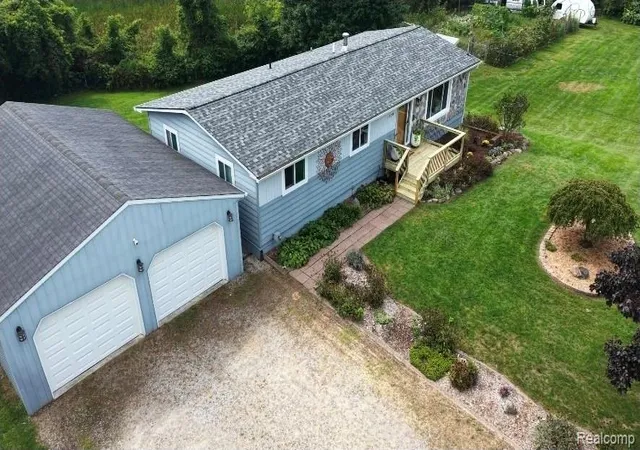 Photo 4 of Single family home for sale at 103 W Sherman St, Holly, MI 48442 | MLS# 20261072593 | Listing updated on 2026-09-14