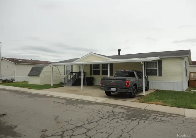 Single family home for sale at 25182 Frontier Cir, Flat Rock, MI 48134 | MLS# 20261072871