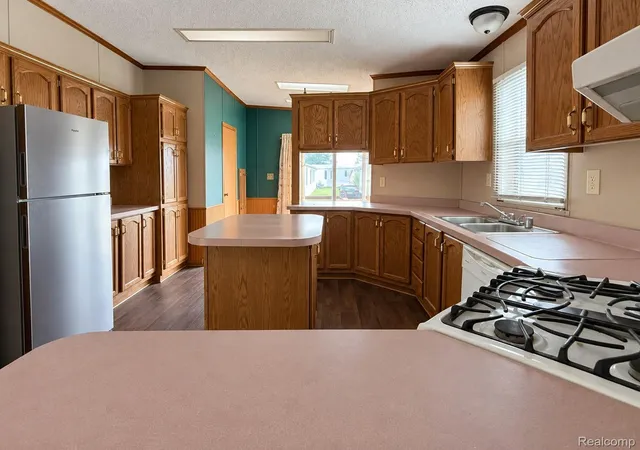 Photo 4 of Single family home for sale at 24654 Deer Crk Dr, Flat Rock, MI 48134 | MLS# 20261073283 | Listing updated on 2026-09-12