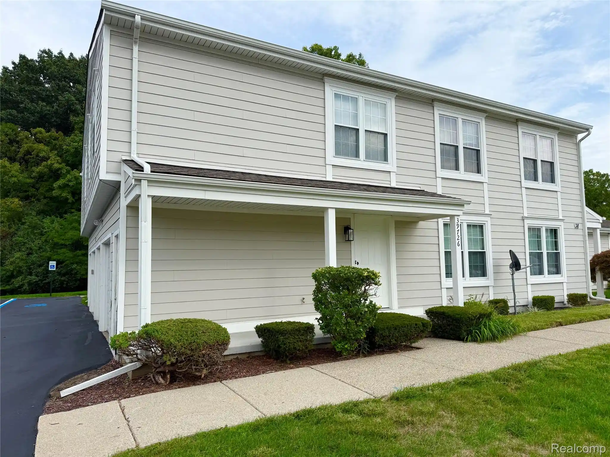 Listing Photo 1 - Condo for sale in 39726 Vlg Wood Ln located at 39726 Vlg Wood Ln, Novi, MI 48375 - Unit 39726 Village Wood Ln
