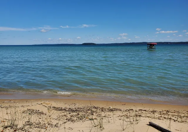 Photo 2 of Land for sale at 00 S W Bay Shore, Traverse City, MI 49684 | MLS# 78080073582 | Listing updated on 2026-10-08