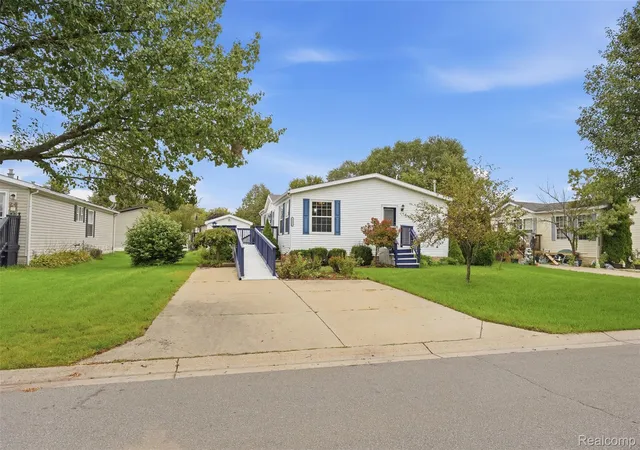 Photo 1 of Single family home for sale at 5486 Spring Crk Dr, Howell, MI 48843 | MLS# 20261075792 | Listing updated on 2026-10-15