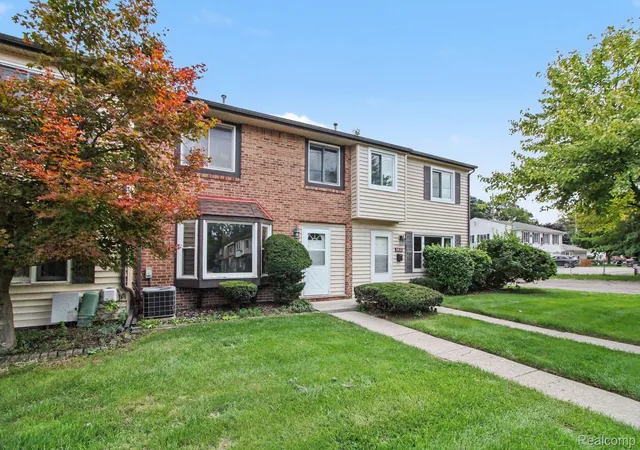 Listing Photo 1 - Condo for sale in building located at 38111 Carolon Blvd, Westland, MI 48185 - Unit #