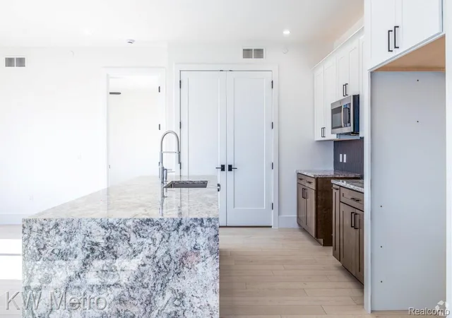 Photo 2 of Condo for sale at 120 E Liberty St #202, Milford, MI 48381 | MLS# 20261077603 | Listing updated on 2026-10-12