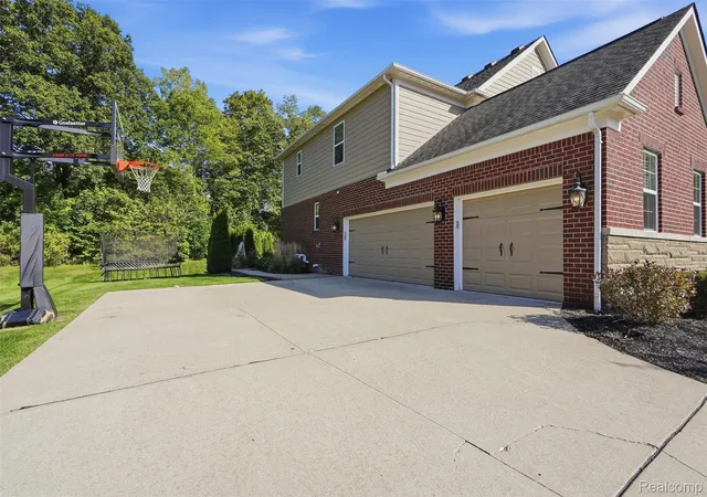Photo 3 of Single family home for sale at 23395 Millwood E Ct, South Lyon, MI 48178 | MLS# 20261077733 | Listing updated on 2026-10-11