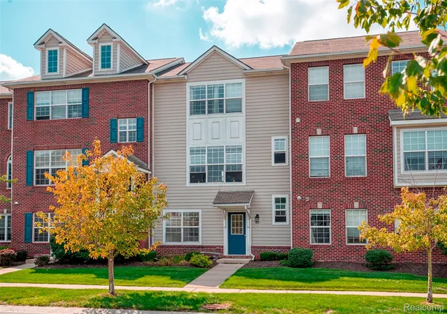 Condo for sale at 1630 Town Cmns Dr, Howell, MI 48855 | MLS# 20261077889