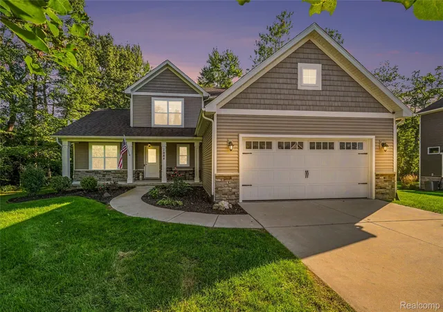 Single family home for sale at 1084 Woods Edge Dr, Hartland, MI 48353 | MLS# 20261079798