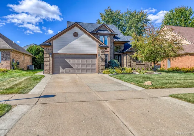 Photo 1 of Single family home for sale at 51541 Pinewood Dr, Macomb, MI 48042 | MLS# 20261080316 | Listing updated on 2026-10-12
