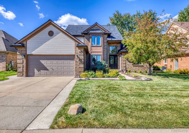 Photo 2 of Single family home for sale at 51541 Pinewood Dr, Macomb, MI 48042 | MLS# 20261080316 | Listing updated on 2026-10-12