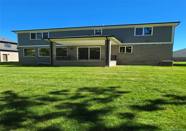 Photo 2 of Single family home for sale at 50385 Arcadia Dr, Macomb, MI 48042 | MLS# 20261080520 | Listing updated on 2026-10-15