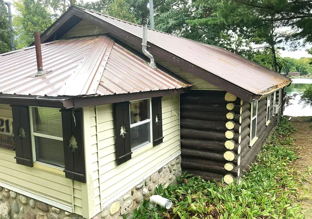Photo 3 of Single family home for sale at 211 N Coolidge Dr, Six Lakes, MI 48886 | MLS# 72026053253 | Listing updated on 2026-10-07