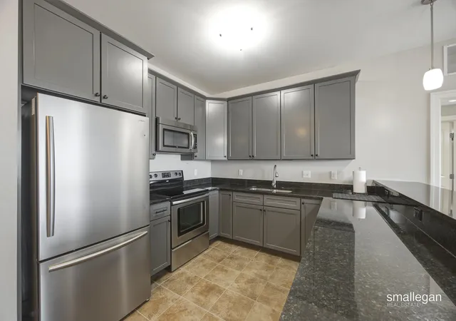 Listing Photo 1 - Condo for sale in building located at 430 Union Ave Ne, Kent, MI 49503 - Unit #208