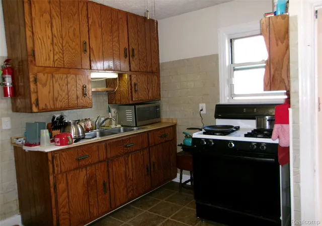Photo 2 of Single family home for sale at 1409 Council Ave, Lincoln Park, MI 48146 | MLS# 20261081357 | Listing updated on 2026-10-08