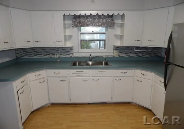 Photo 2 of Single family home for sale at 122 W Beecher St, Adrian, MI 49221 | MLS# 56050224143 | Listing updated on 2026-10-07