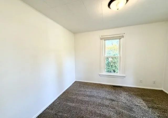Photo 2 of Single family home for sale at 422 Rockingham Ave, Alma, MI 48801 | MLS# 79080074338 | Listing updated on 2026-10-11