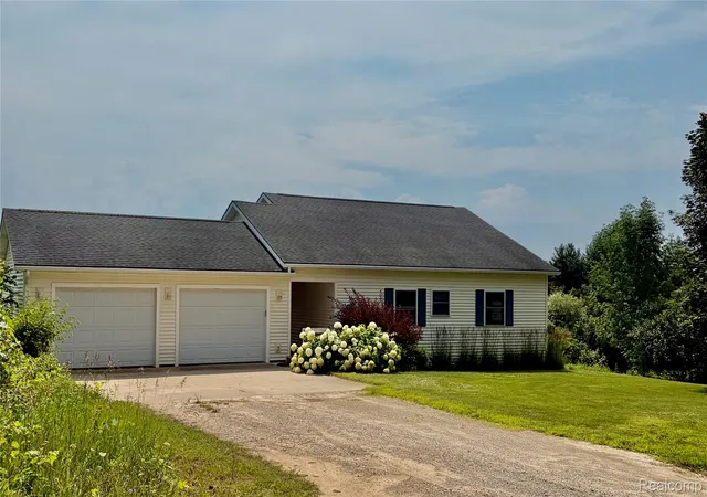 Single family home for sale at 12621 Jones Rd, Kewadin, MI 49648 | MLS# 20261081733