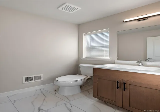 Listing Photo 1 - Condo for sale in building located at 35308 Brittany Dr, New Baltimore, MI 48047 - Unit #119
