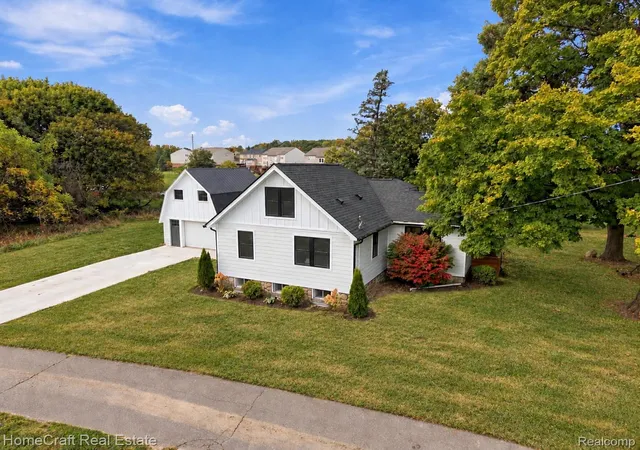 Photo 2 of Single family home for sale at 58744 10 Mile Rd, South Lyon, MI 48178 | MLS# 20261083371 | Listing updated on 2026-10-26