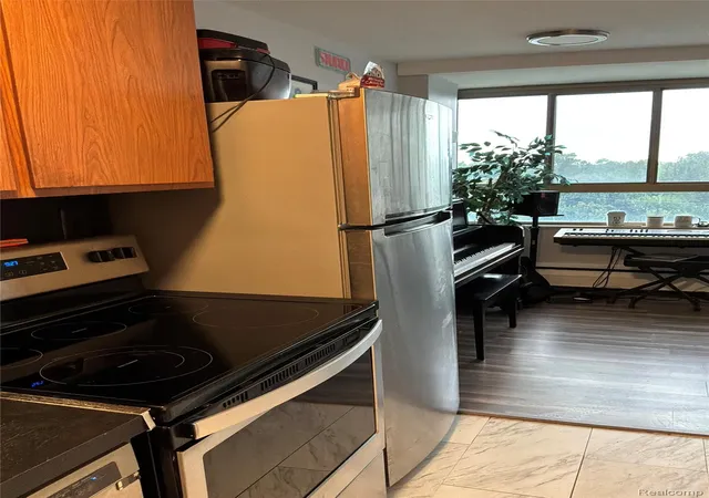 Listing Photo 1 - Condo for sale in building located at 8900 E Jefferson Ave, Detroit, MI 48214 - Unit #602