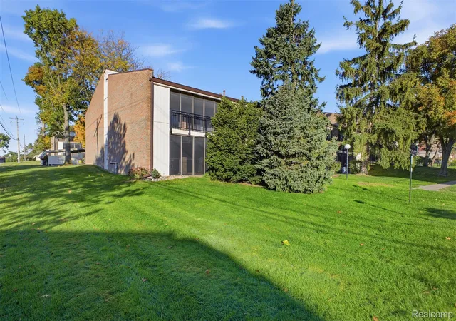 Listing Photo 1 - Condo for sale in building located at 18217 University Park Dr, Livonia, MI 48152